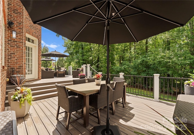 7005 Camrose Crossing Ln, Matthews, NC 28104 - deck featuring outdoor dining space and an outdoor living space