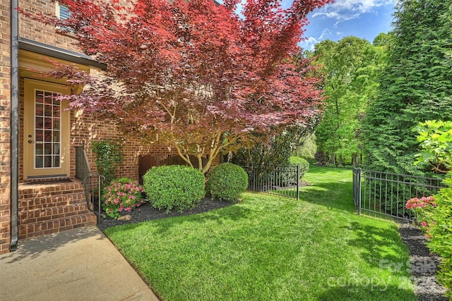 view of yard with fence