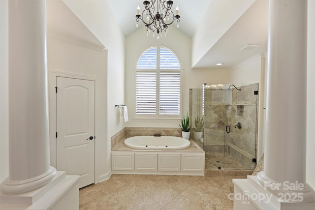 2001 Arundale Ln, Matthews, NC 28104 - bathroom featuring a chandelier, vaulted ceiling, a garden tub, and a stall shower