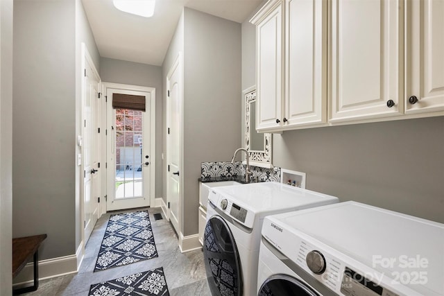 2001 Arundale Ln, Matthews, NC 28104 - clothes washing area with baseboards, a sink, cabinet space, and washer and dryer