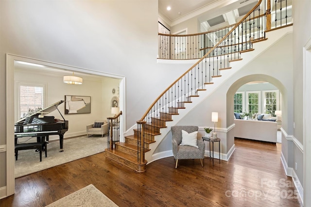 2001 Arundale Ln, Matthews, NC 28104 - stairs with wood finished floors, a high ceiling, and a wealth of natural light