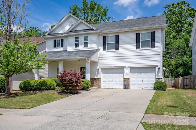 9904 Rocky Ford Club Rd, Charlotte, NC 28269 - craftsman inspired home with a front lawn, driveway, a garage, and fence