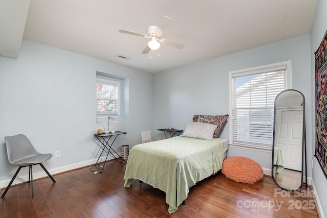 9904 Rocky Ford Club Rd, Charlotte, NC 28269 - bedroom with a ceiling fan, visible vents, wood finished floors, and baseboards
