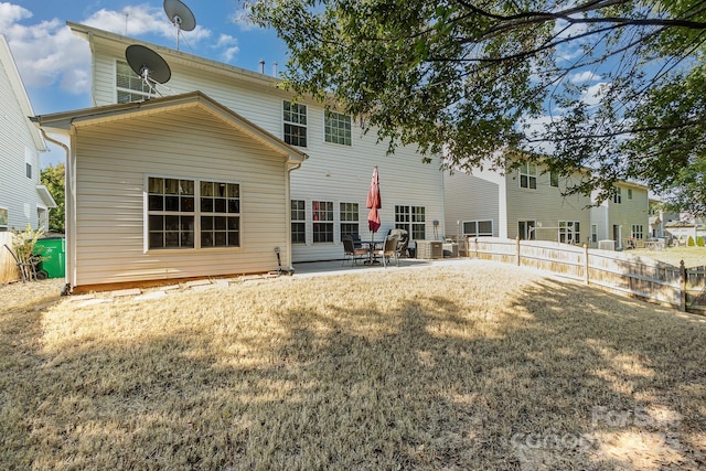 9904 Rocky Ford Club Rd, Charlotte, NC 28269 - rear view of house featuring a patio, a yard, and fence