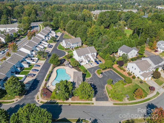 9904 Rocky Ford Club Rd, Charlotte, NC 28269 - drone / aerial view featuring a residential view and a wooded view