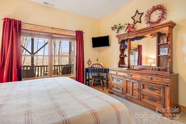 bedroom with visible vents and carpet floors