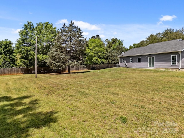 view of yard featuring fence