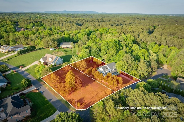 3 Kensington Ct, Granite Falls, NC 28630 - drone / aerial view with a wooded view