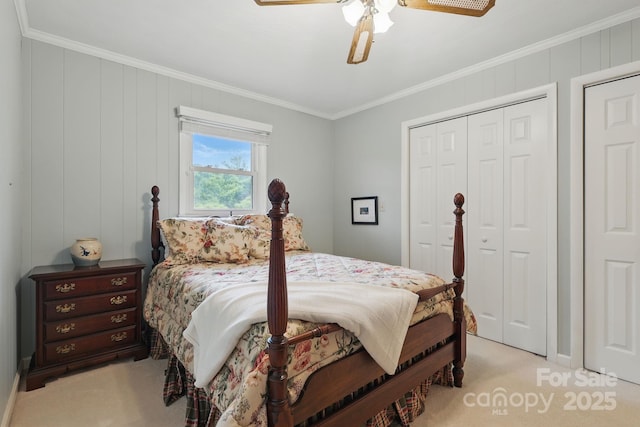 174 Sunny Knoll Ln, Boone, NC 28607 - bedroom with crown molding, light colored carpet, a ceiling fan, and a closet