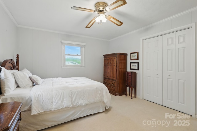 174 Sunny Knoll Ln, Boone, NC 28607 - bedroom featuring a closet, ornamental molding, light carpet, and a ceiling fan