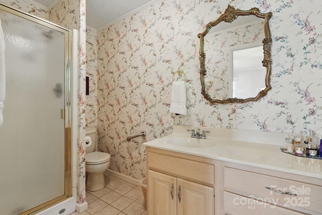 174 Sunny Knoll Ln, Boone, NC 28607 - bathroom featuring crown molding, vanity, tile patterned floors, a shower stall, and wallpapered walls