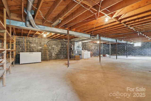 174 Sunny Knoll Ln, Boone, NC 28607 - basement with refrigerator, washer / dryer, and heating unit