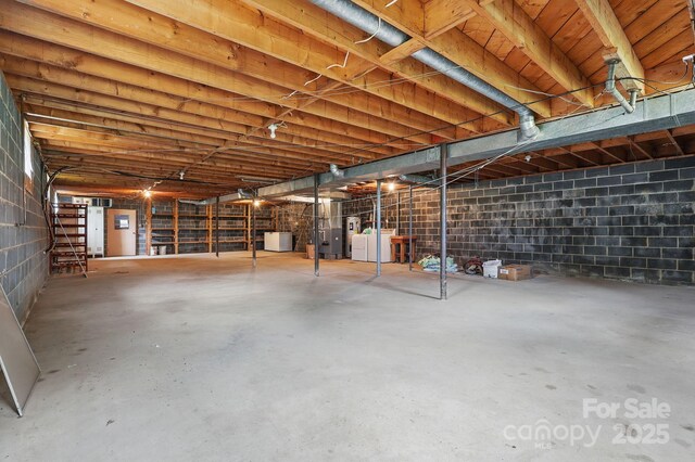 174 Sunny Knoll Ln, Boone, NC 28607 - unfinished basement featuring washer / dryer