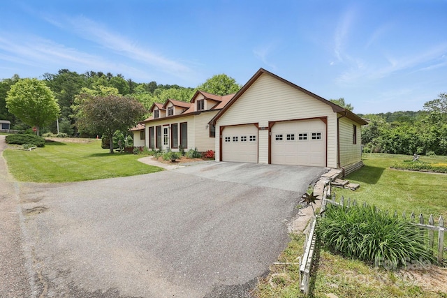 137 Clint Lewis Rd, Boone, NC 28607 - view of front of property featuring a front lawn, a garage, and driveway