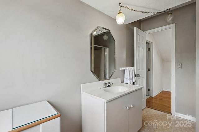 137 Clint Lewis Rd, Boone, NC 28607 - bathroom featuring vanity, baseboards, and a shower