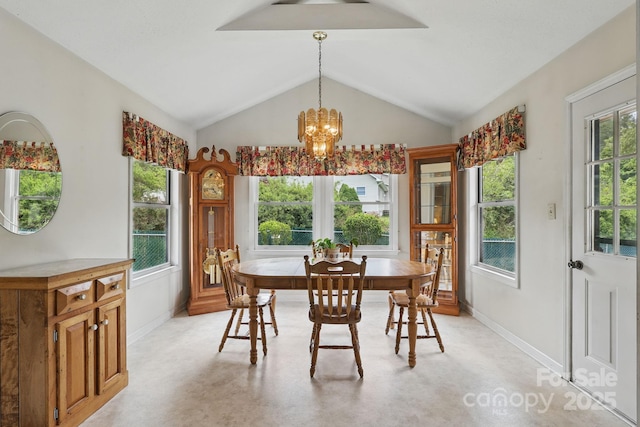 137 Clint Lewis Rd, Boone, NC 28607 - dining area featuring baseboards, lofted ceiling, and a chandelier