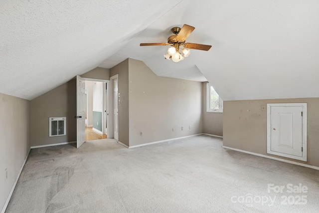 137 Clint Lewis Rd, Boone, NC 28607 - additional living space featuring lofted ceiling, carpet, ceiling fan, and baseboards