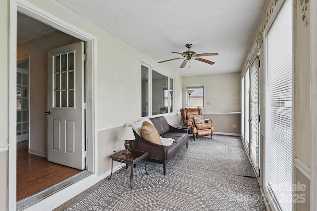 137 Clint Lewis Rd, Boone, NC 28607 - sunroom / solarium featuring baseboards, a textured ceiling, and carpet