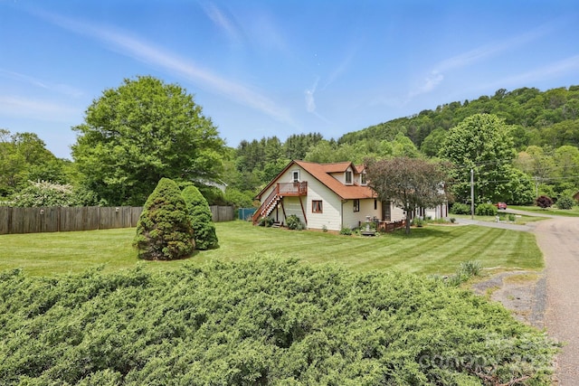 137 Clint Lewis Rd, Boone, NC 28607 - view of yard with stairway, a forest view, and a wooden deck