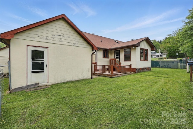 137 Clint Lewis Rd, Boone, NC 28607 - rear view of house featuring a wooden deck and stucco siding