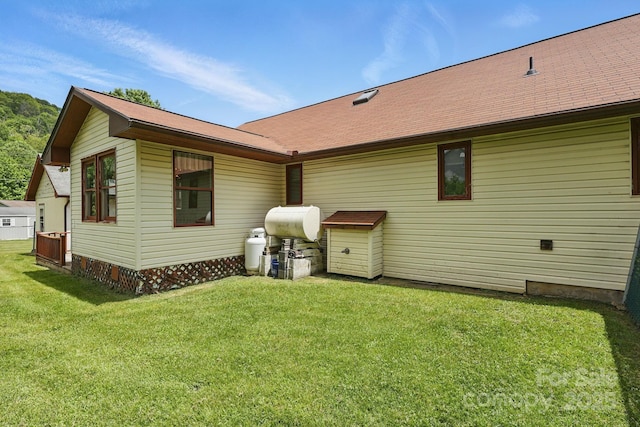 137 Clint Lewis Rd, Boone, NC 28607 - rear view of house with a yard