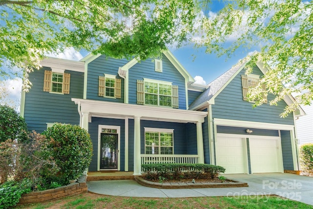 8428 Westmoreland Lake Dr, Cornelius, NC 28031 - traditional-style home with a porch and driveway