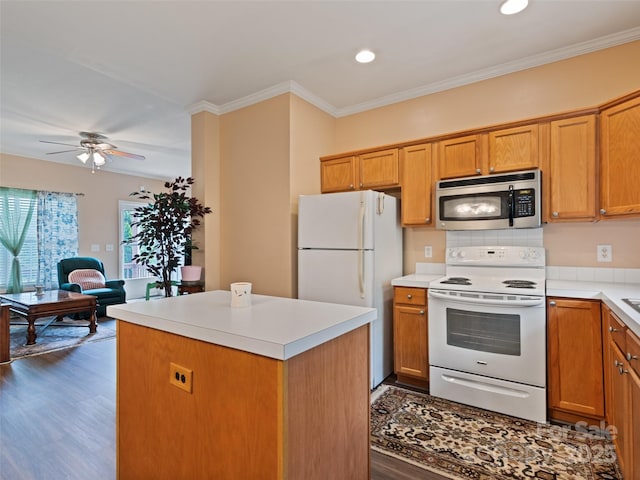 kitchen featuring white appliances, dark wood-style floors, ceiling fan, open floor plan, and light countertops