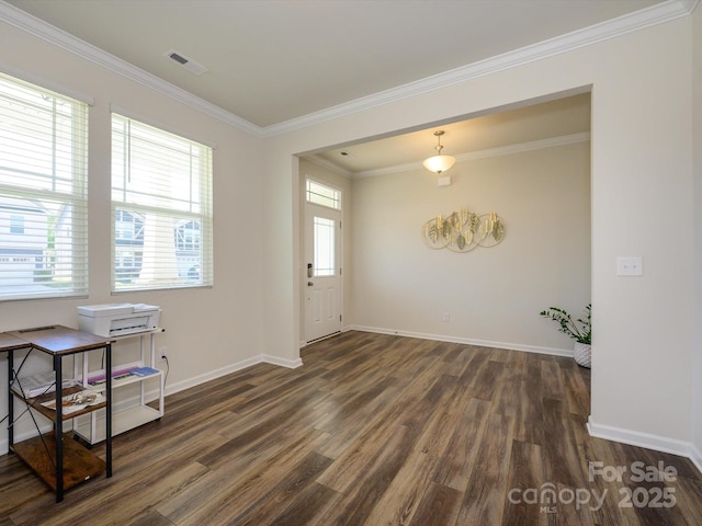 1516 Laggan Ln, Indian Trail, NC 28079 - foyer with crown molding, dark wood-type flooring, baseboards, and visible vents