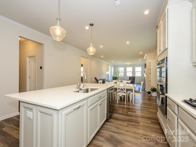 1516 Laggan Ln, Indian Trail, NC 28079 - kitchen with stainless steel appliances, open floor plan, ornamental molding, and a sink