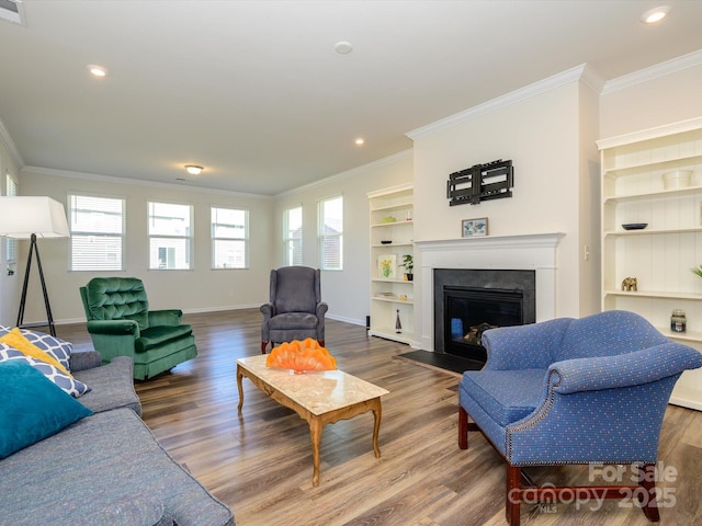 1516 Laggan Ln, Indian Trail, NC 28079 - living room with crown molding, a wealth of natural light, baseboards, and wood finished floors