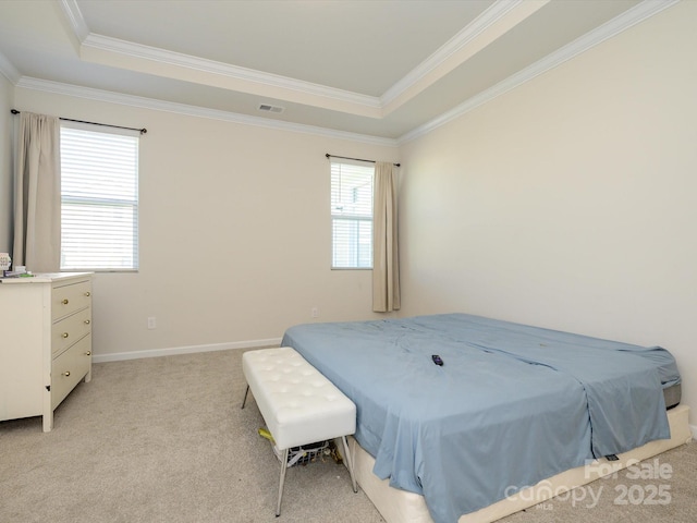 1516 Laggan Ln, Indian Trail, NC 28079 - bedroom with crown molding, visible vents, baseboards, a raised ceiling, and light colored carpet