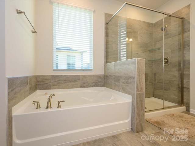 1516 Laggan Ln, Indian Trail, NC 28079 - bathroom featuring a bath and a shower stall