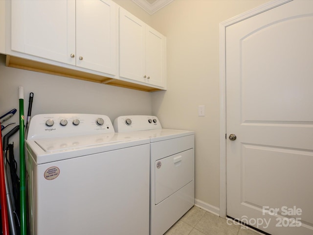1516 Laggan Ln, Indian Trail, NC 28079 - laundry area featuring baseboards, ornamental molding, light tile patterned flooring, separate washer and dryer, and cabinet space