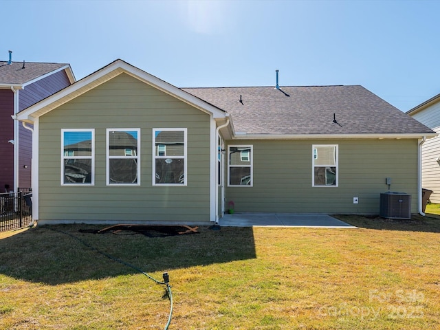1516 Laggan Ln, Indian Trail, NC 28079 - rear view of house featuring a patio, central AC unit, and a shingled roof