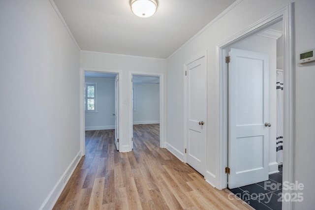 402 Hudson St, Winnsboro, SC 29180 - hall featuring light wood-type flooring, baseboards, and crown molding