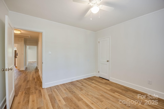 402 Hudson St, Winnsboro, SC 29180 - unfurnished room featuring a ceiling fan, crown molding, attic access, light wood finished floors, and baseboards