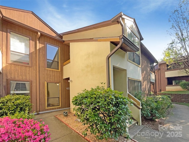 exterior space with stucco siding