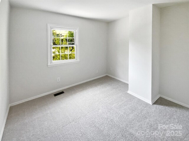 8026 Regent Park Ln, Charlotte, NC 28210 - unfurnished room with carpet and baseboards