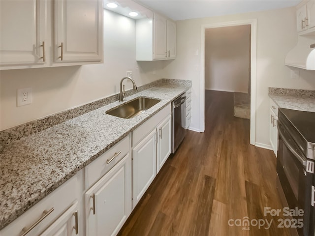 8026 Regent Park Ln, Charlotte, NC 28210 - kitchen featuring stainless steel dishwasher, a sink, dark wood-type flooring, white cabinetry, and light stone countertops