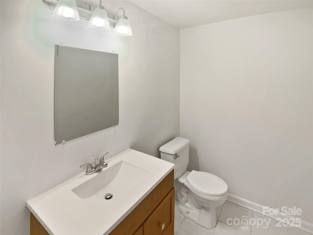 8026 Regent Park Ln, Charlotte, NC 28210 - bathroom featuring vanity, tile patterned flooring, and toilet