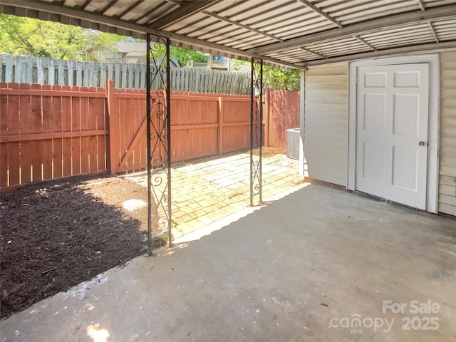 8026 Regent Park Ln, Charlotte, NC 28210 - view of patio / terrace featuring central AC