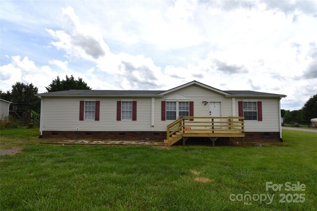 234 Olin Loop, Olin, NC 28660 - manufactured / mobile home featuring crawl space, a front yard, and a deck