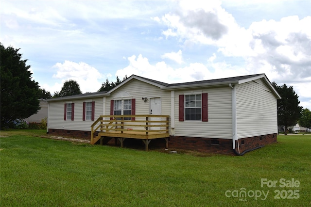 234 Olin Loop, Olin, NC 28660 - back of house featuring crawl space, a deck, and a lawn