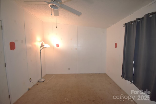 234 Olin Loop, Olin, NC 28660 - spare room featuring light carpet and ceiling fan