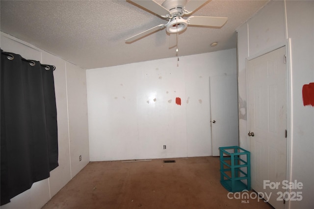 234 Olin Loop, Olin, NC 28660 - unfurnished room with ceiling fan and a textured ceiling