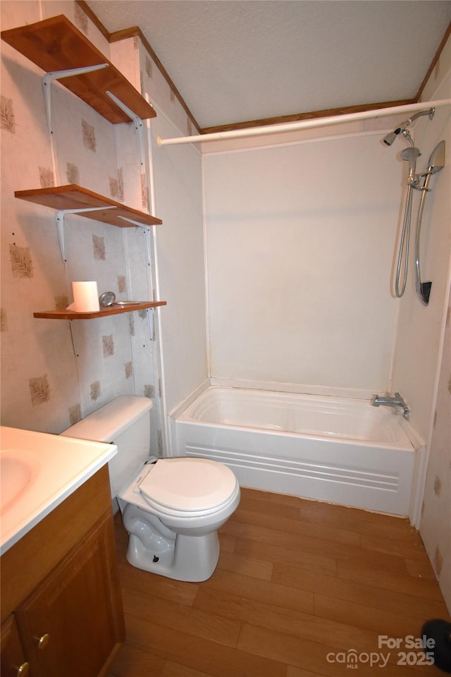 234 Olin Loop, Olin, NC 28660 - full bathroom with wood finished floors, bathing tub / shower combination, and vanity