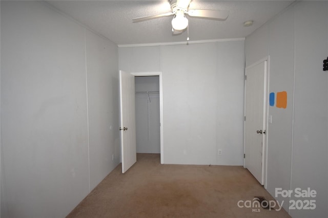 234 Olin Loop, Olin, NC 28660 - unfurnished bedroom featuring light carpet, a ceiling fan, and a textured ceiling