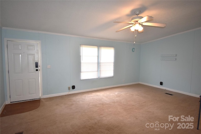 234 Olin Loop, Olin, NC 28660 - empty room featuring crown molding, a ceiling fan, and carpet