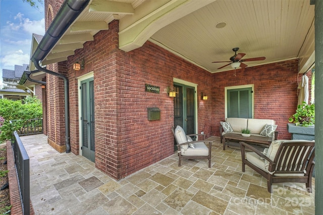 view of patio with ceiling fan, outdoor lounge area, and french doors