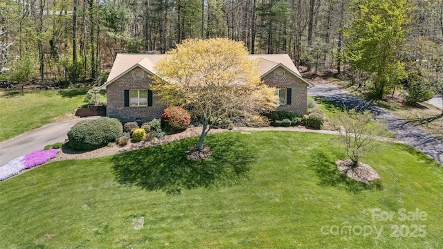 147 Canaan Dr, Candler, NC 28715 - view of front of property featuring driveway and a front yard